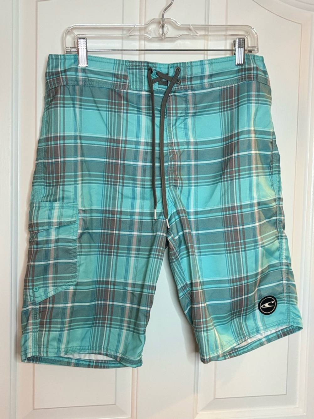 EUC O'Neill Men’s Teal Plaid Boardshorts With Velcro and tie closure size 32